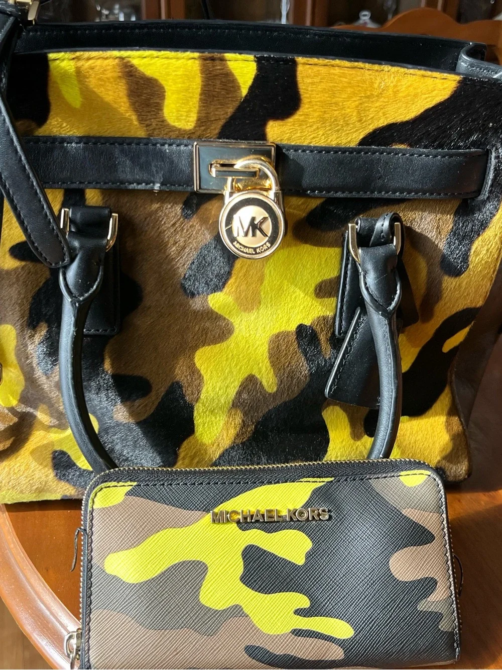 Michael Kors: Calf Hair & Leather w/ Fatigue design
